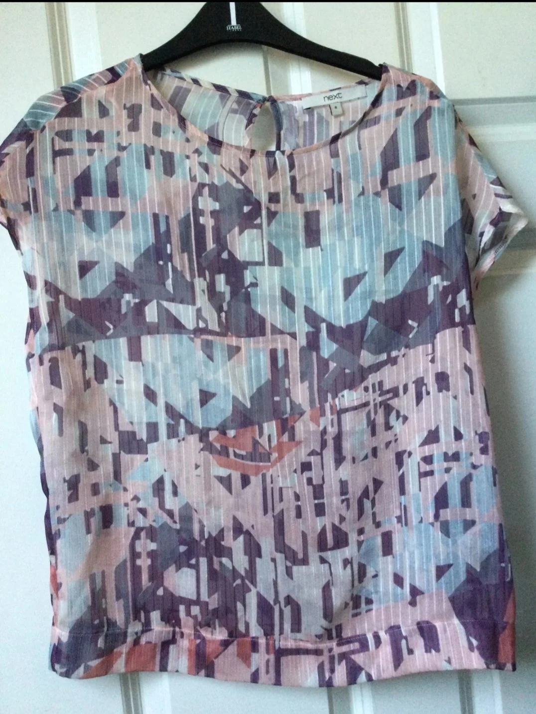 Semi sheer sleeveless top