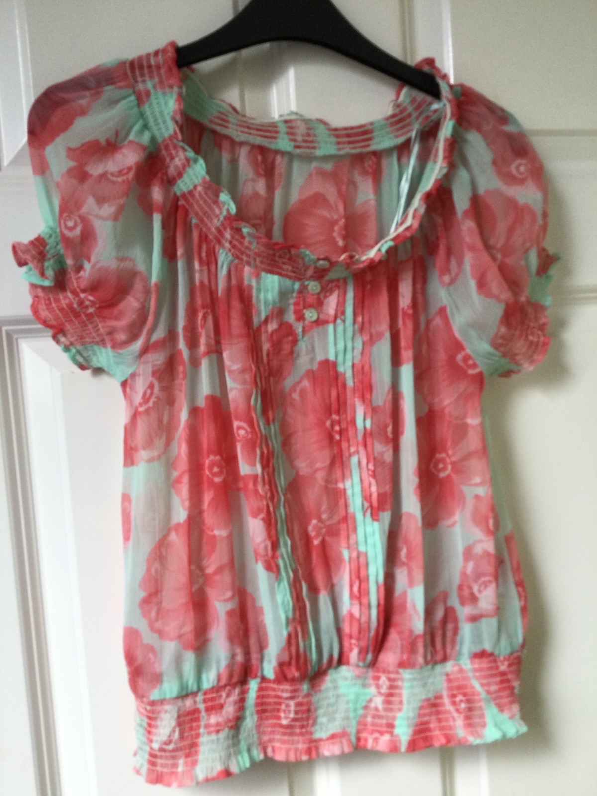 Ladies floral blouse. Semi sheer