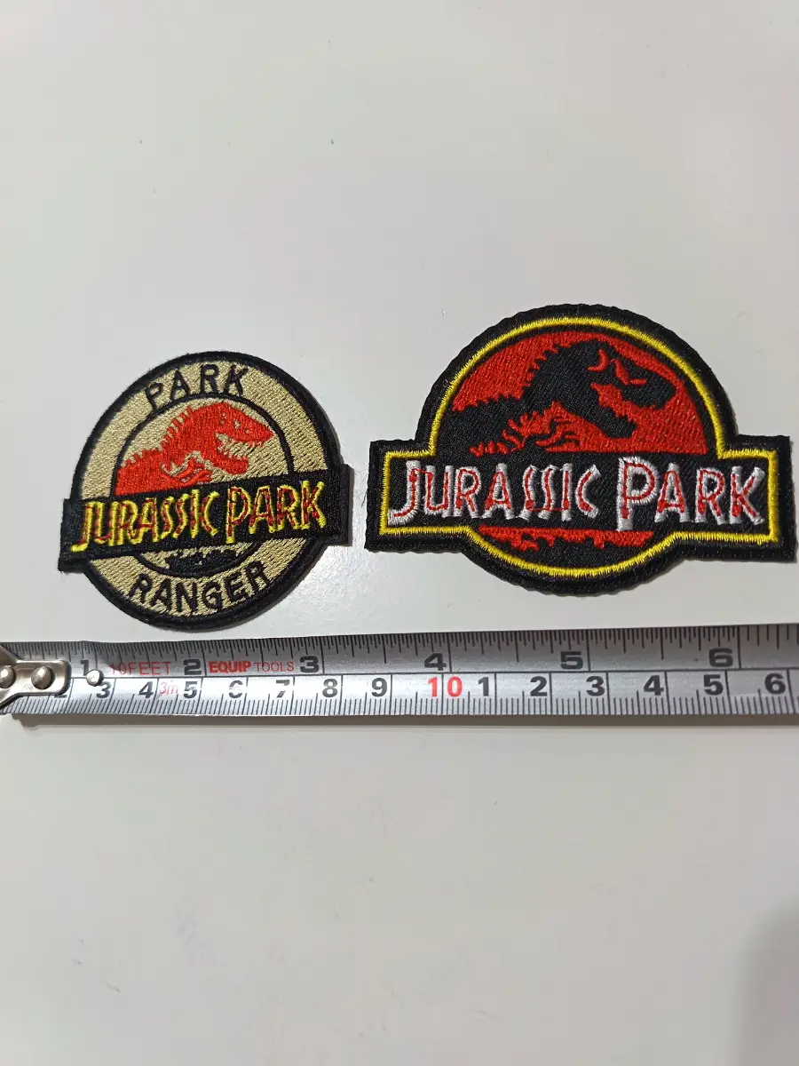 Pair of two Jurassic Park iron on patches