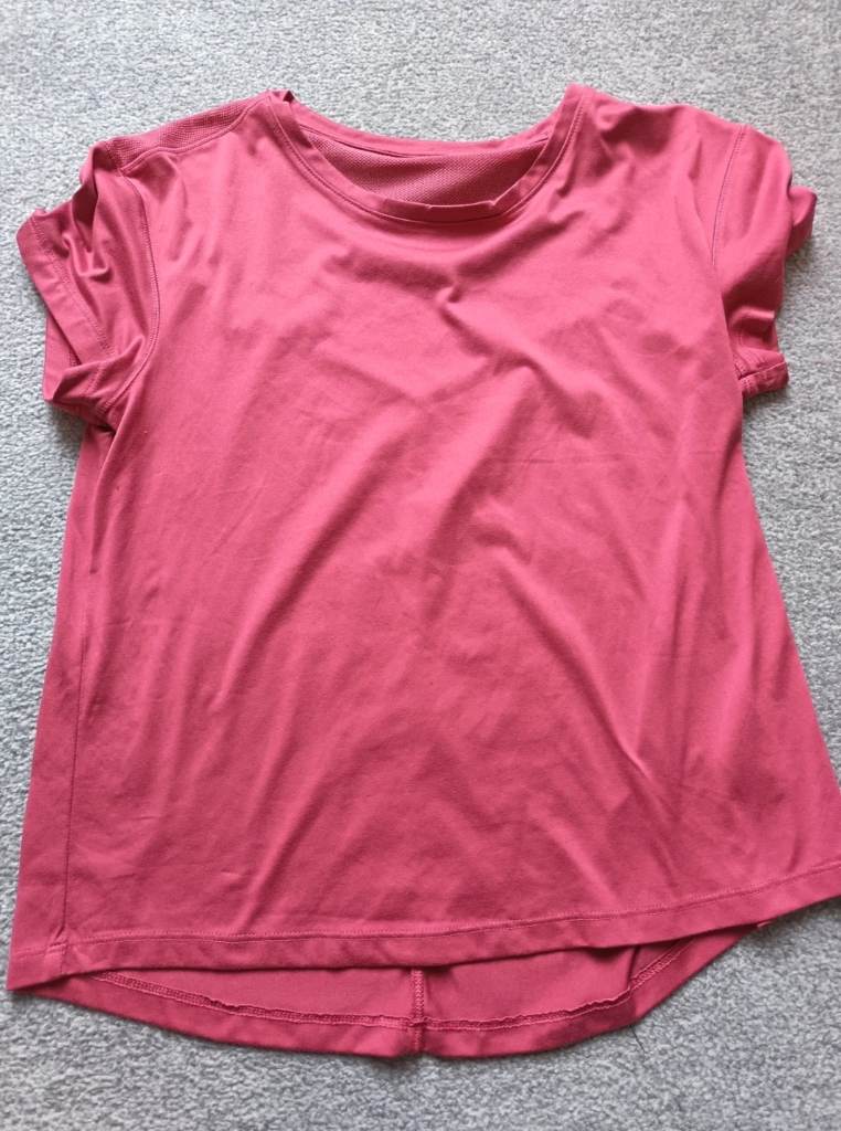 Crivit size small 8 / 10 pink gym running top with mesh back