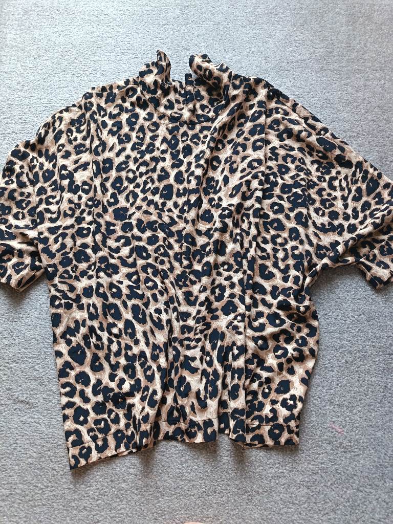 Primark size 8 leopard print blouse with tie neck at the back
