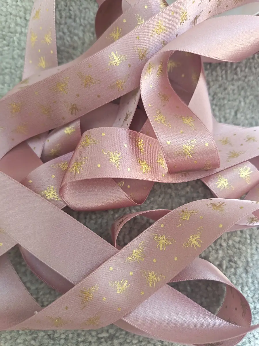 5 metres of Berisfords sparkle bee 25mm width ribbon rose gold