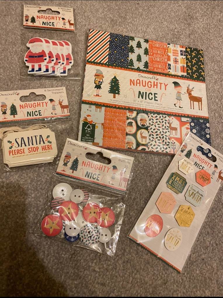Bundle of Dovecraft Naughty or Nice 8” paper and embellishments