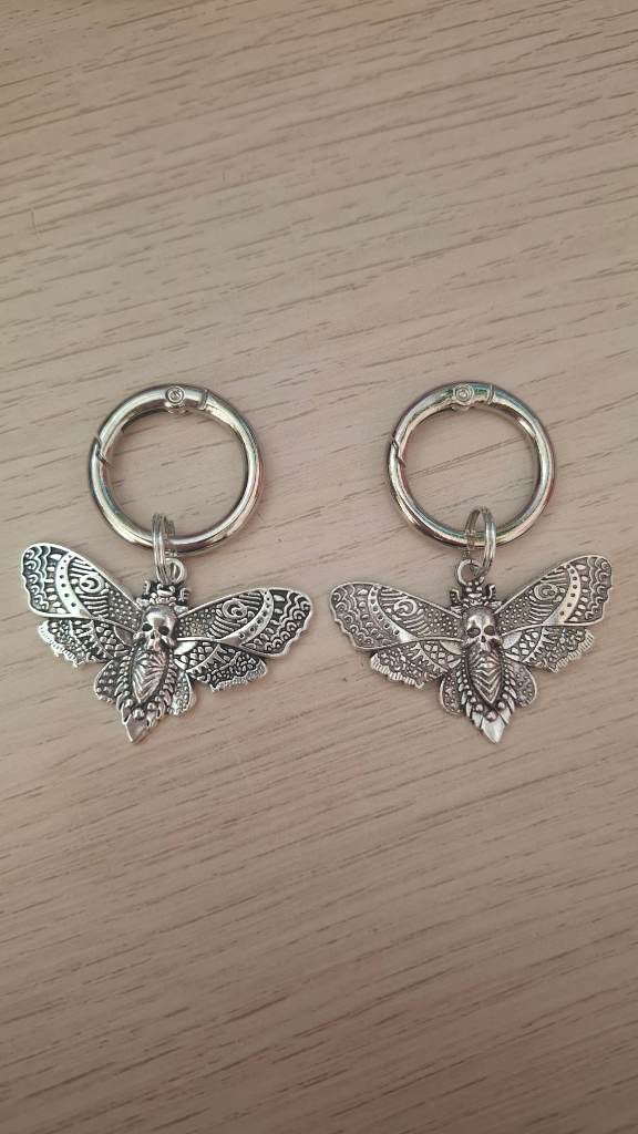 Cute Alternative quirky boot charms with silver moth mothman death head moth detail charms.