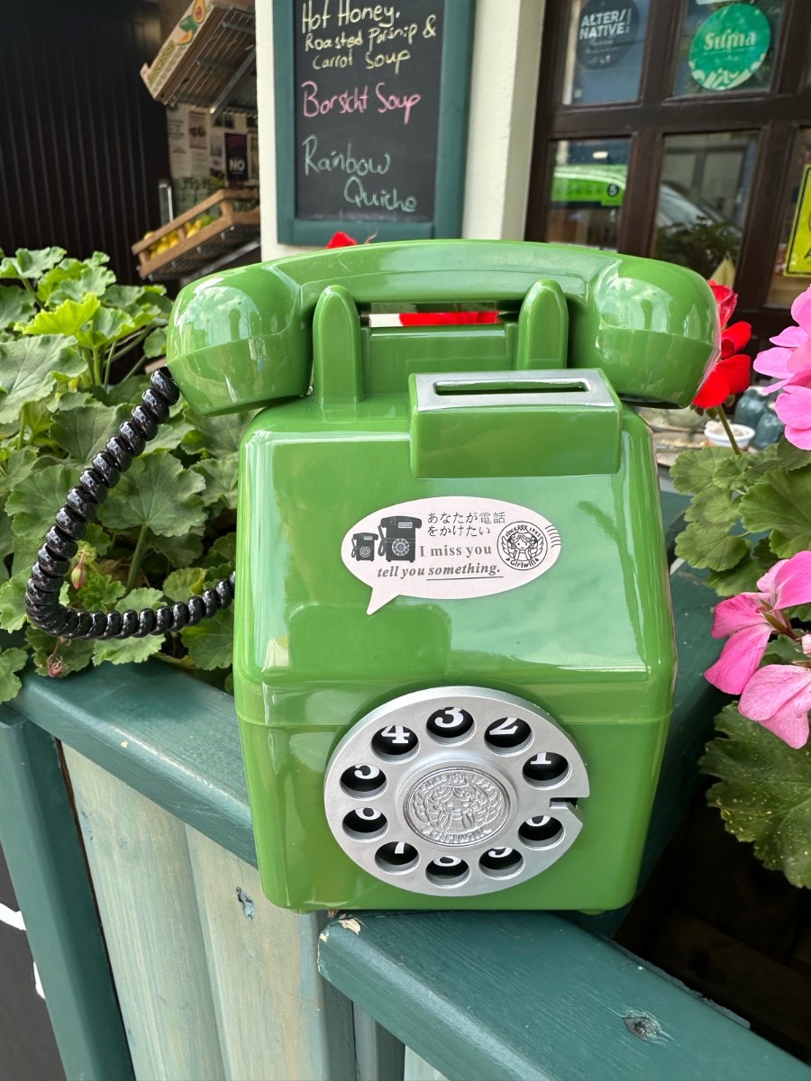 Green old fashioned style phone money box