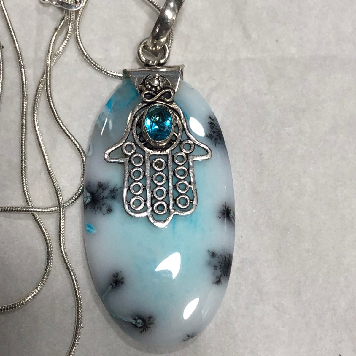 Dendritic Opal with faceted  blue topaz sterling silver