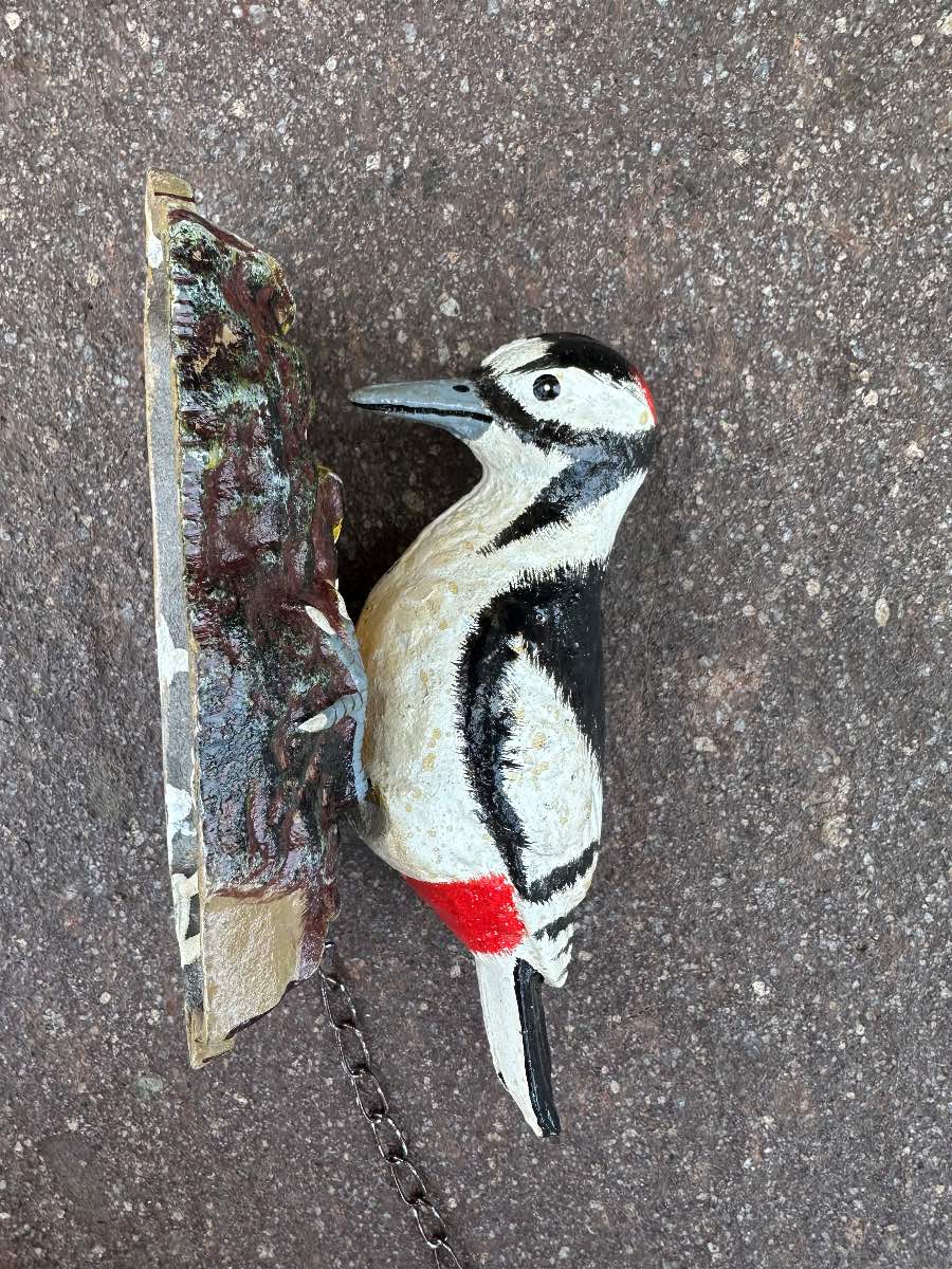 Woodpecker cast iron door knocker