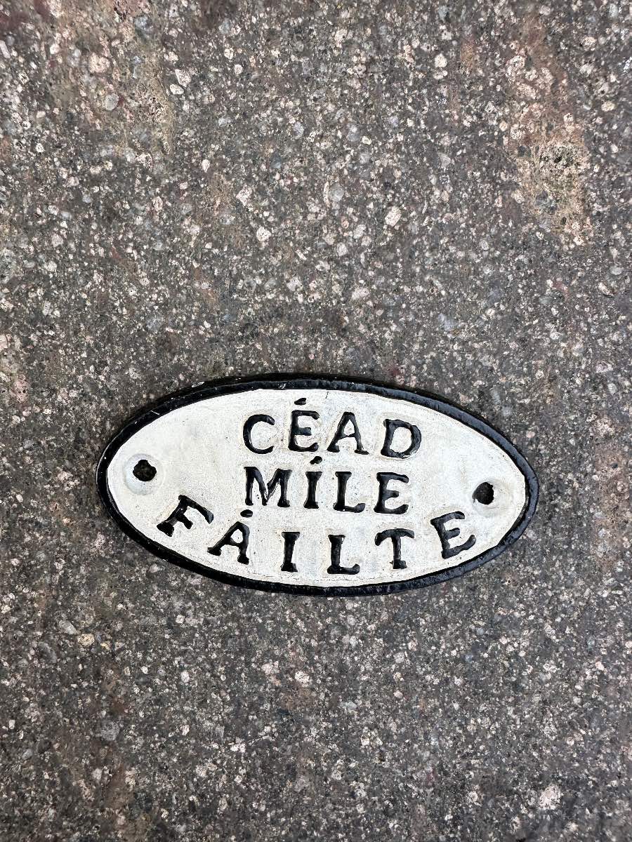 Cead Mike Failte cast iron sign