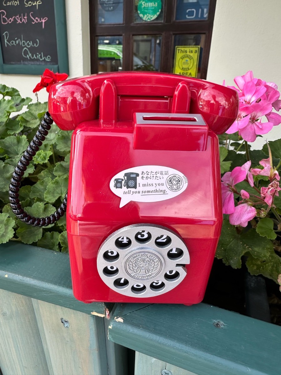 Red old fashion style phone money box
