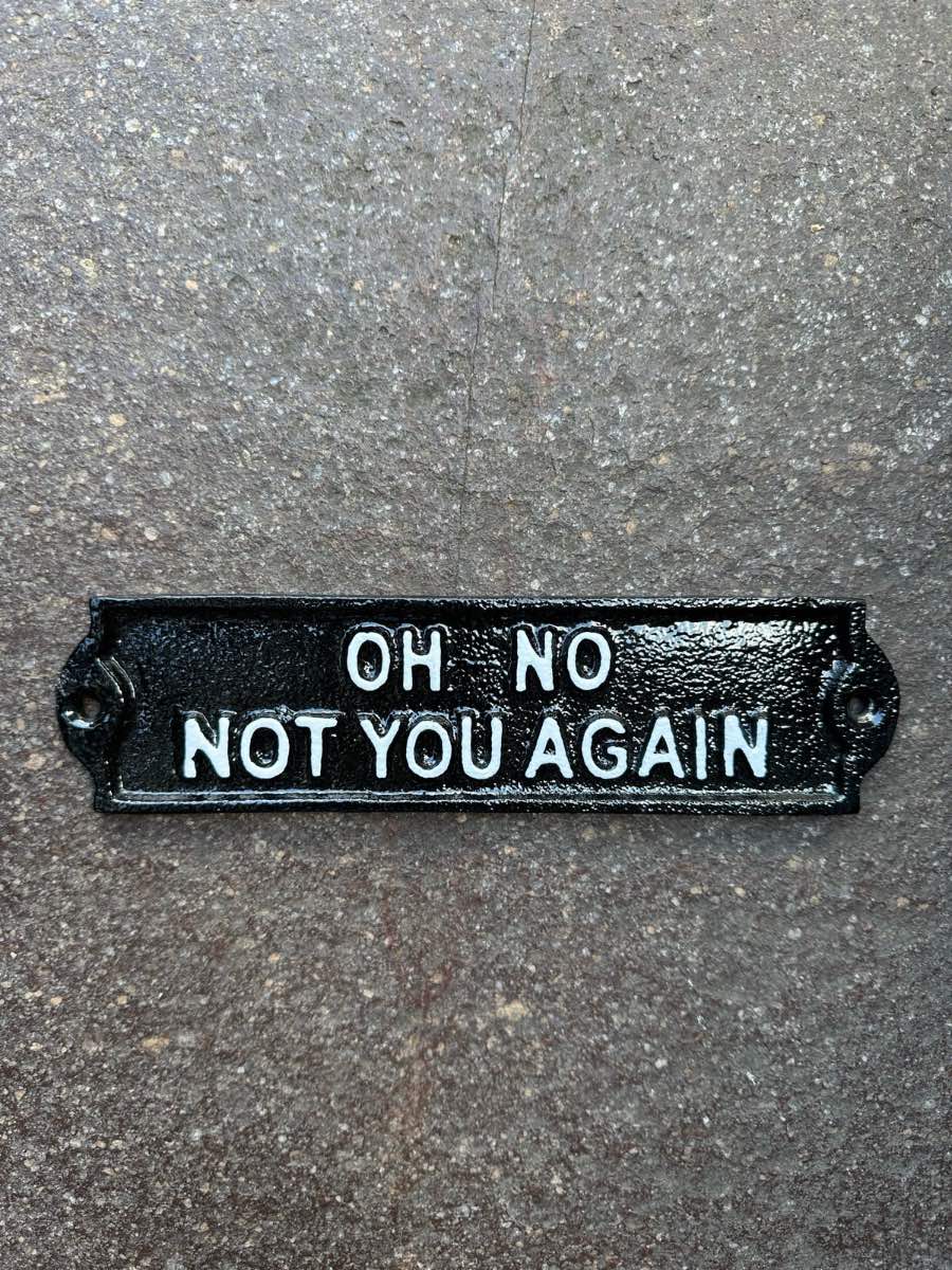 Oh no not you again cast iron sign