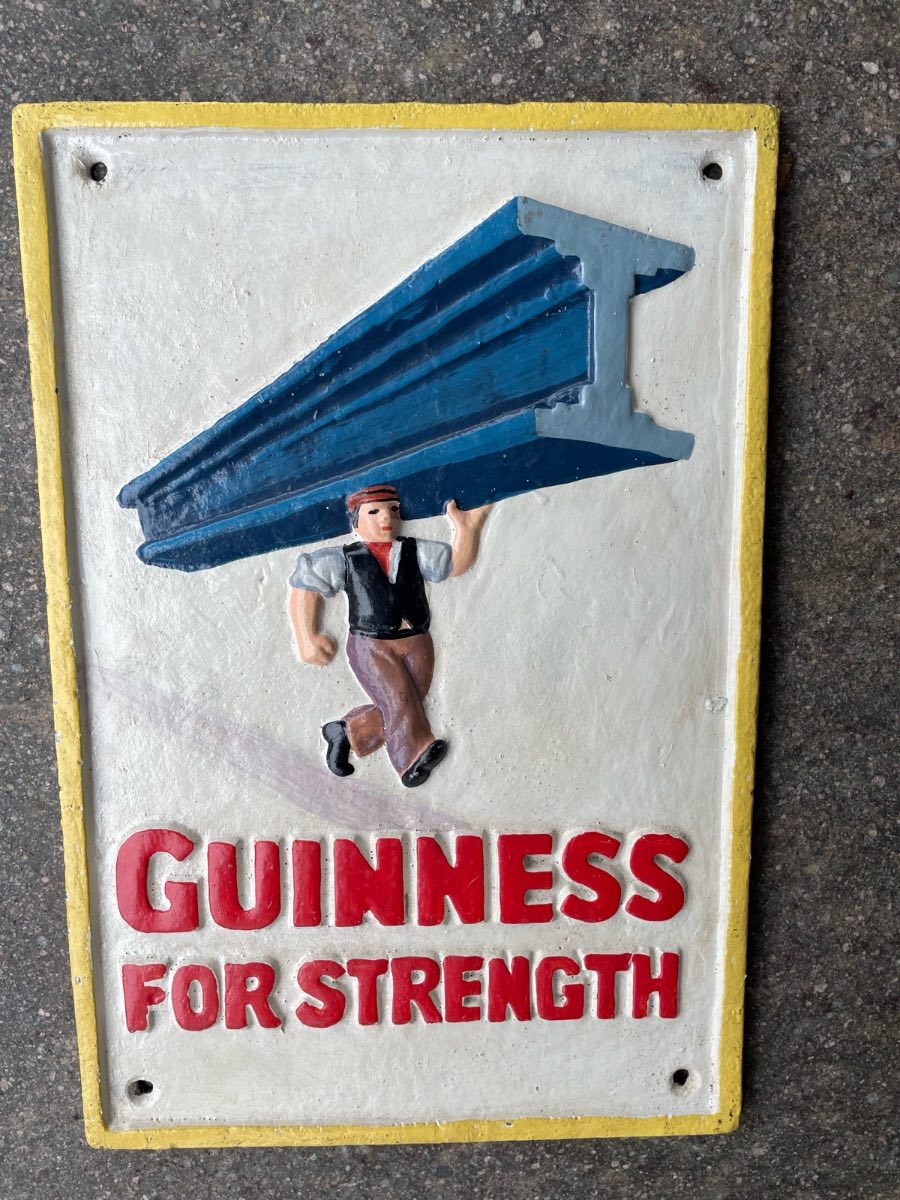 Guinness for strength cast iron sign