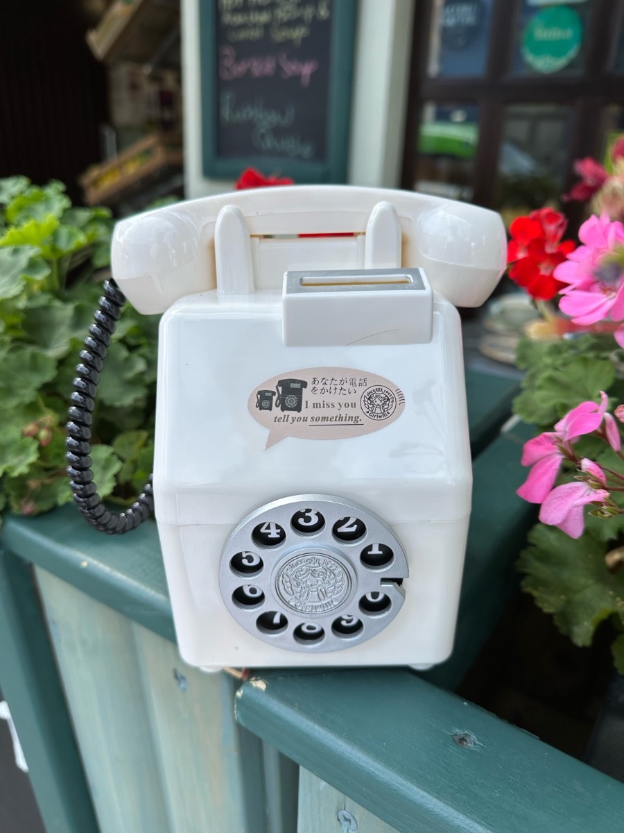Cream old fashioned style phone money box