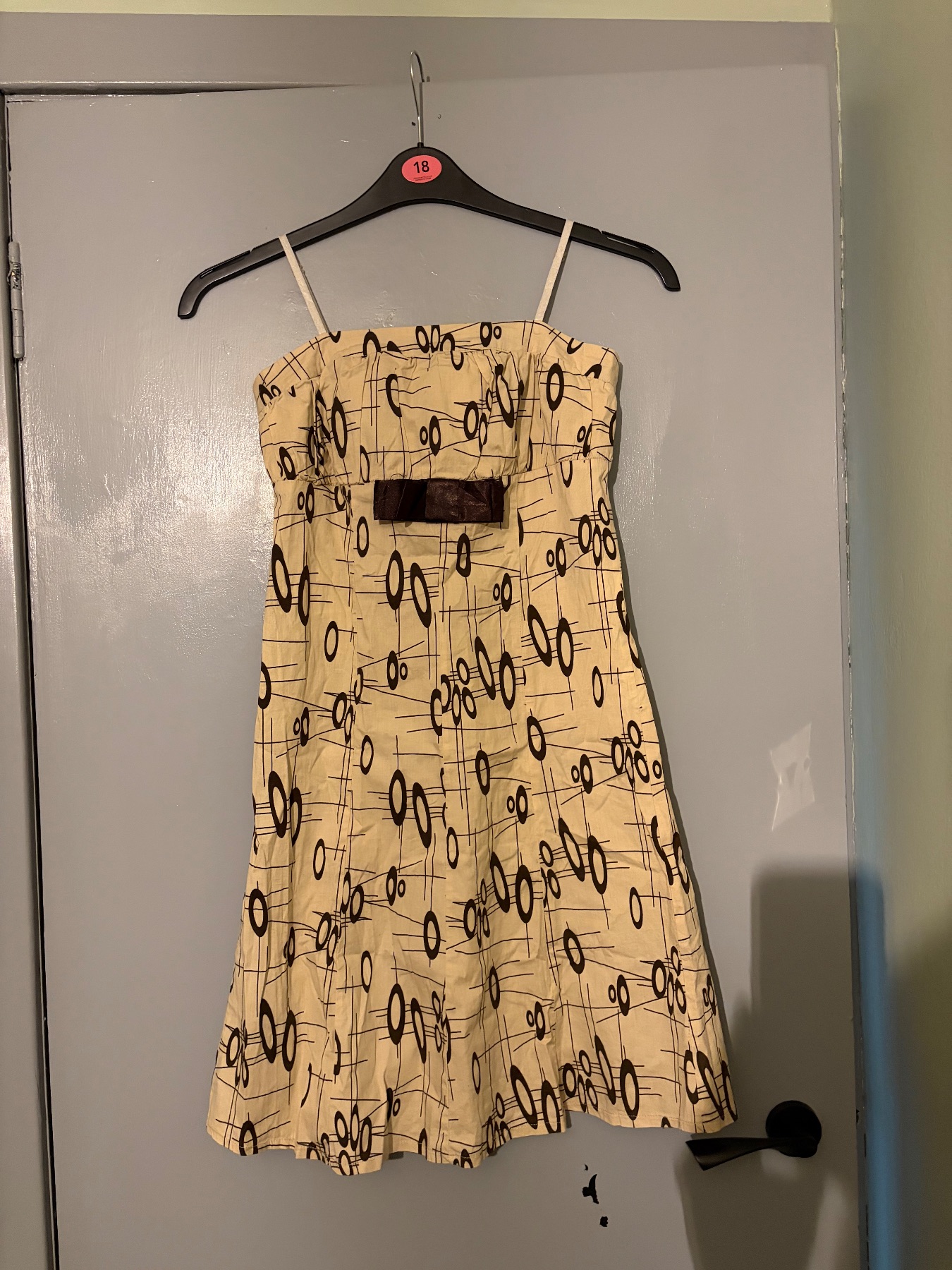 Golden Days cream & tan mini dress with black abstract circular and linear pattern
