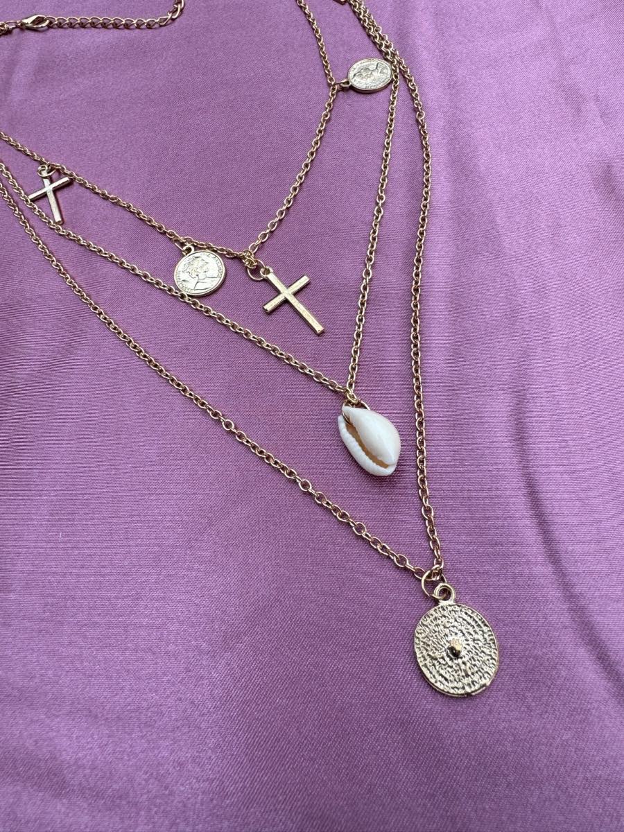 Beautiful gold plated multilayered necklace with shell details