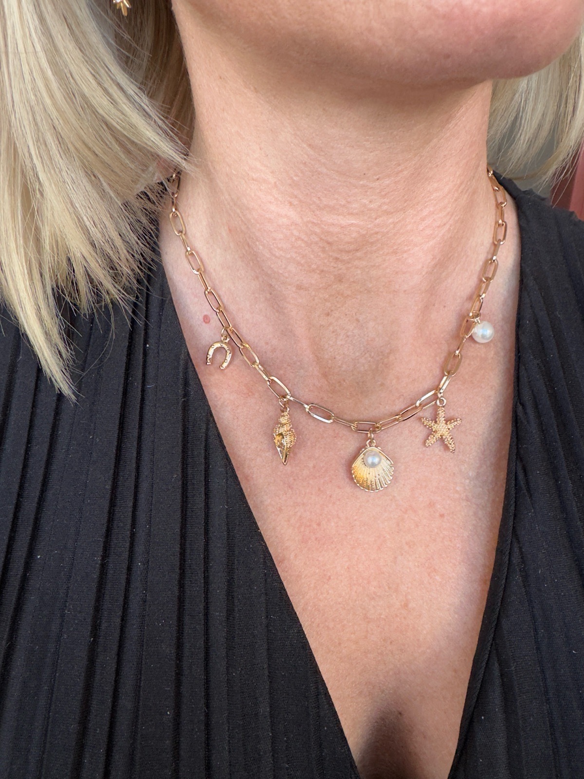 Beautiful gold palted necklace with shell charms