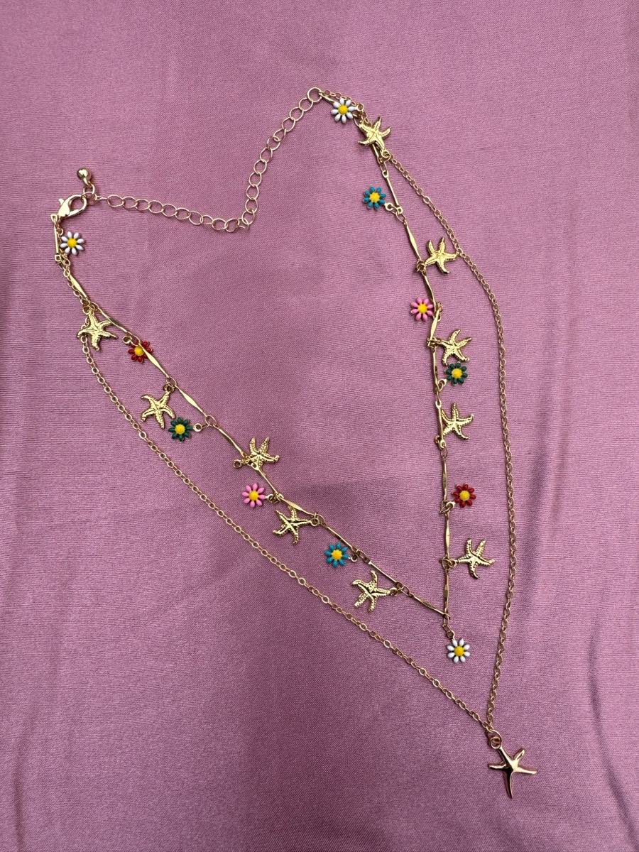 Beautiful gold plated multilayered necklace with starfish details