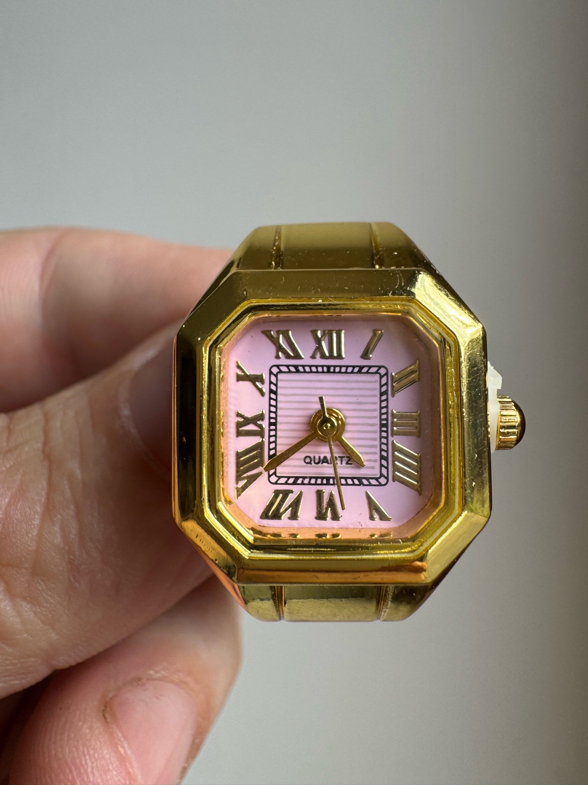 Beautiful ring watch with pink face