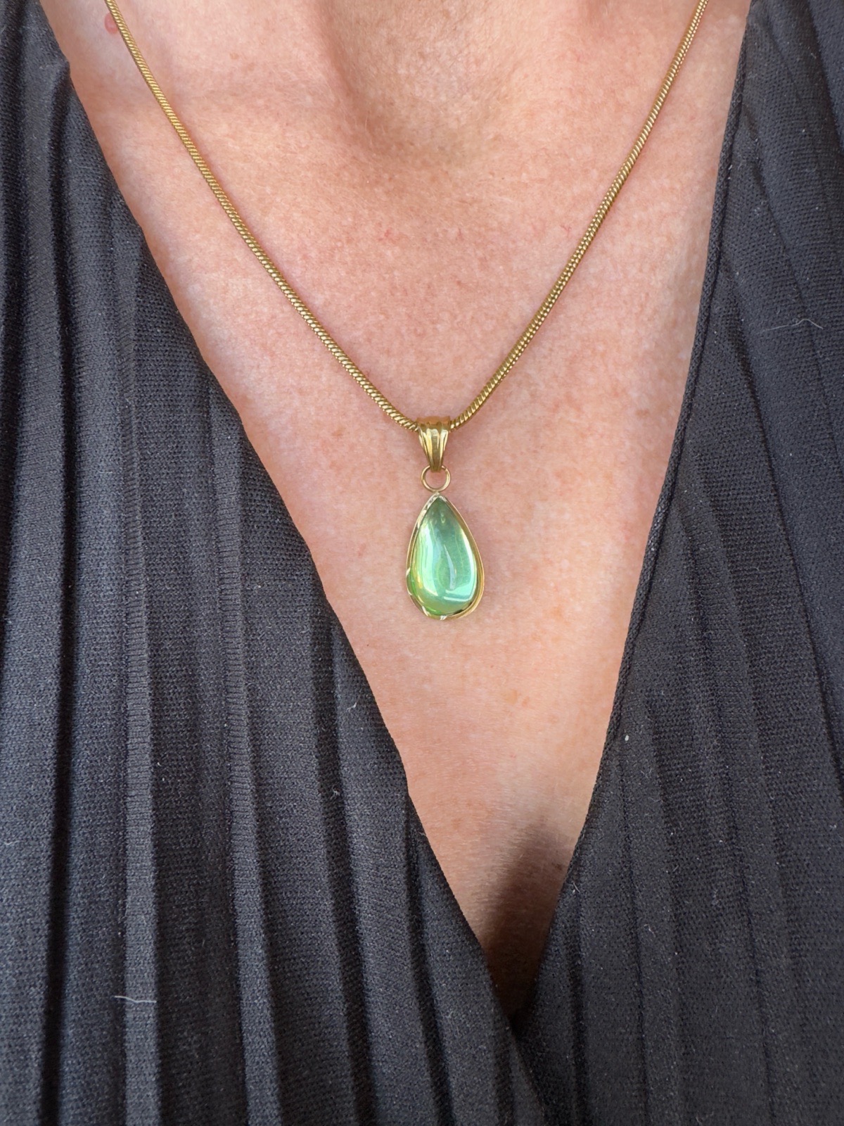 Beautiful gold plated necklace with central green drop
