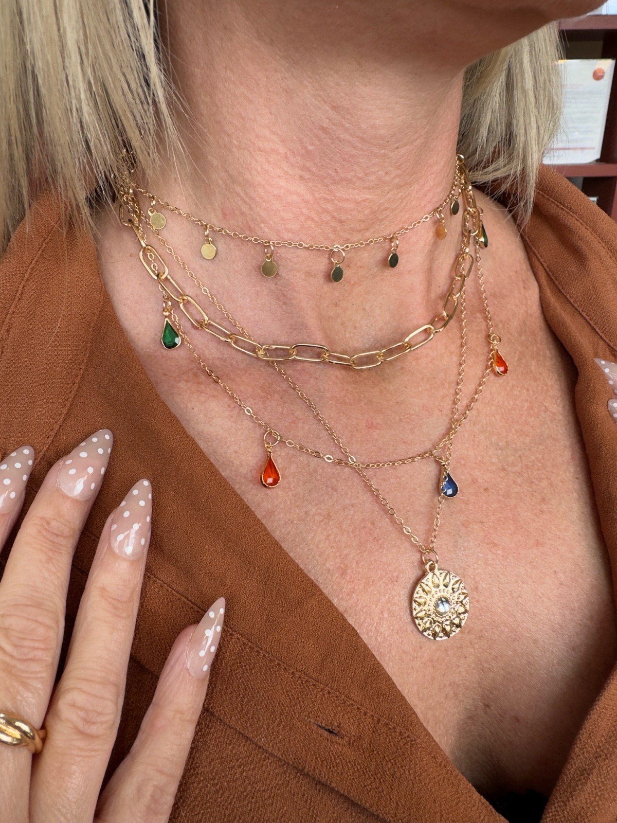 Beautiful multilayered necklace with central medallion