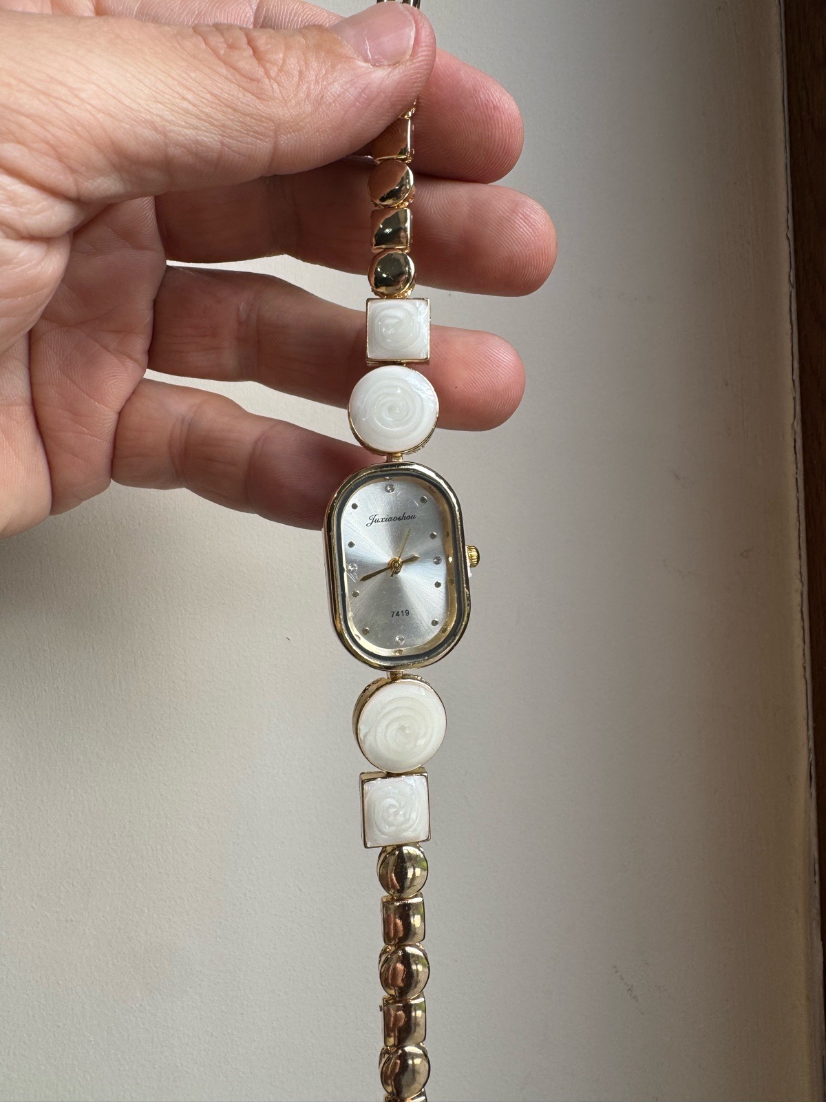 Beautiful watch with white stones details