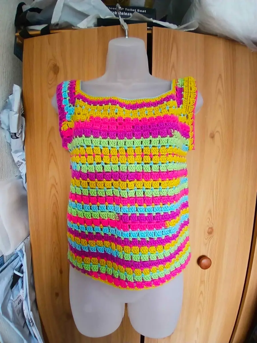 Hand crochet top .