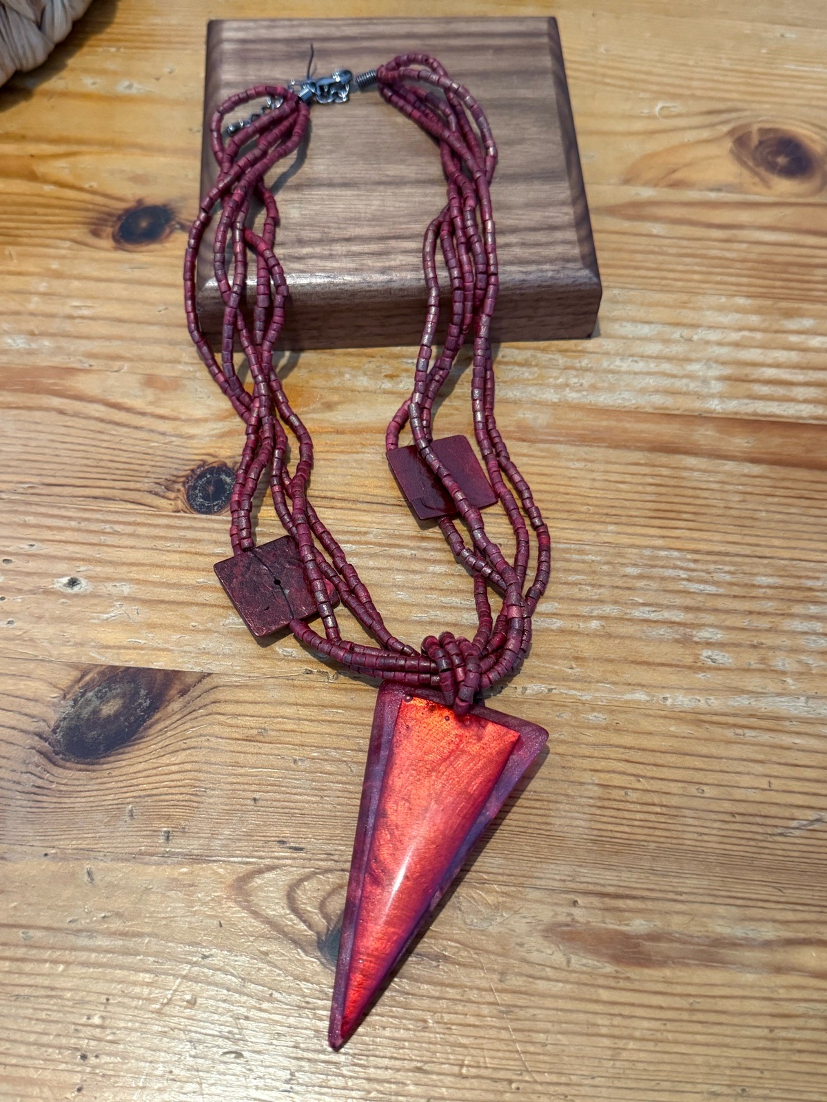 multi strand seed beaded burgundy/ red necklace with triangular statement pendant