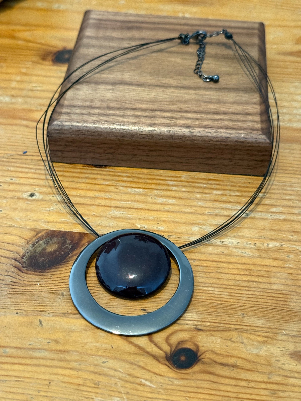 Black pendant necklace with silver ring, wire necklace