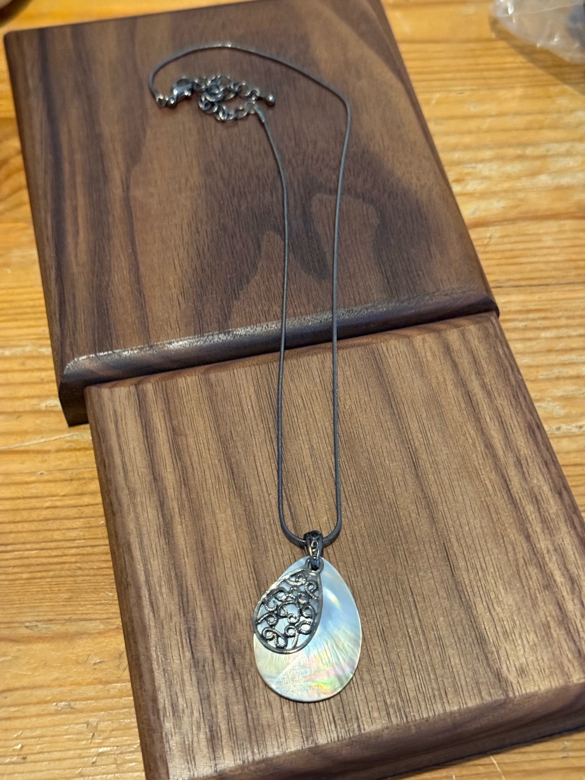 silver tone snake chain necklace with mother of pearl pendant