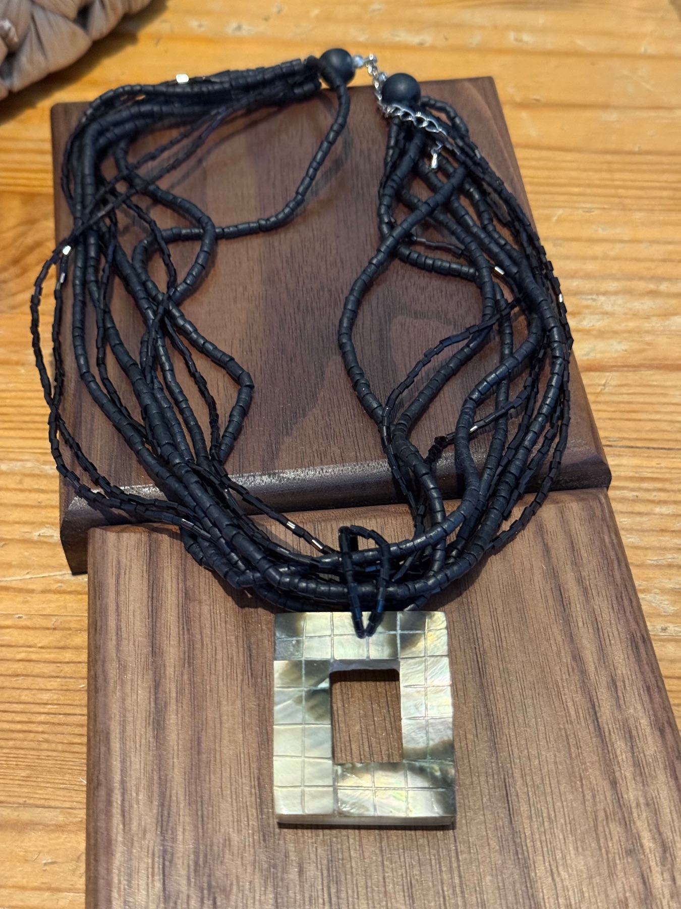 multi strand seed beaded necklace with rectangle mosaic pendant