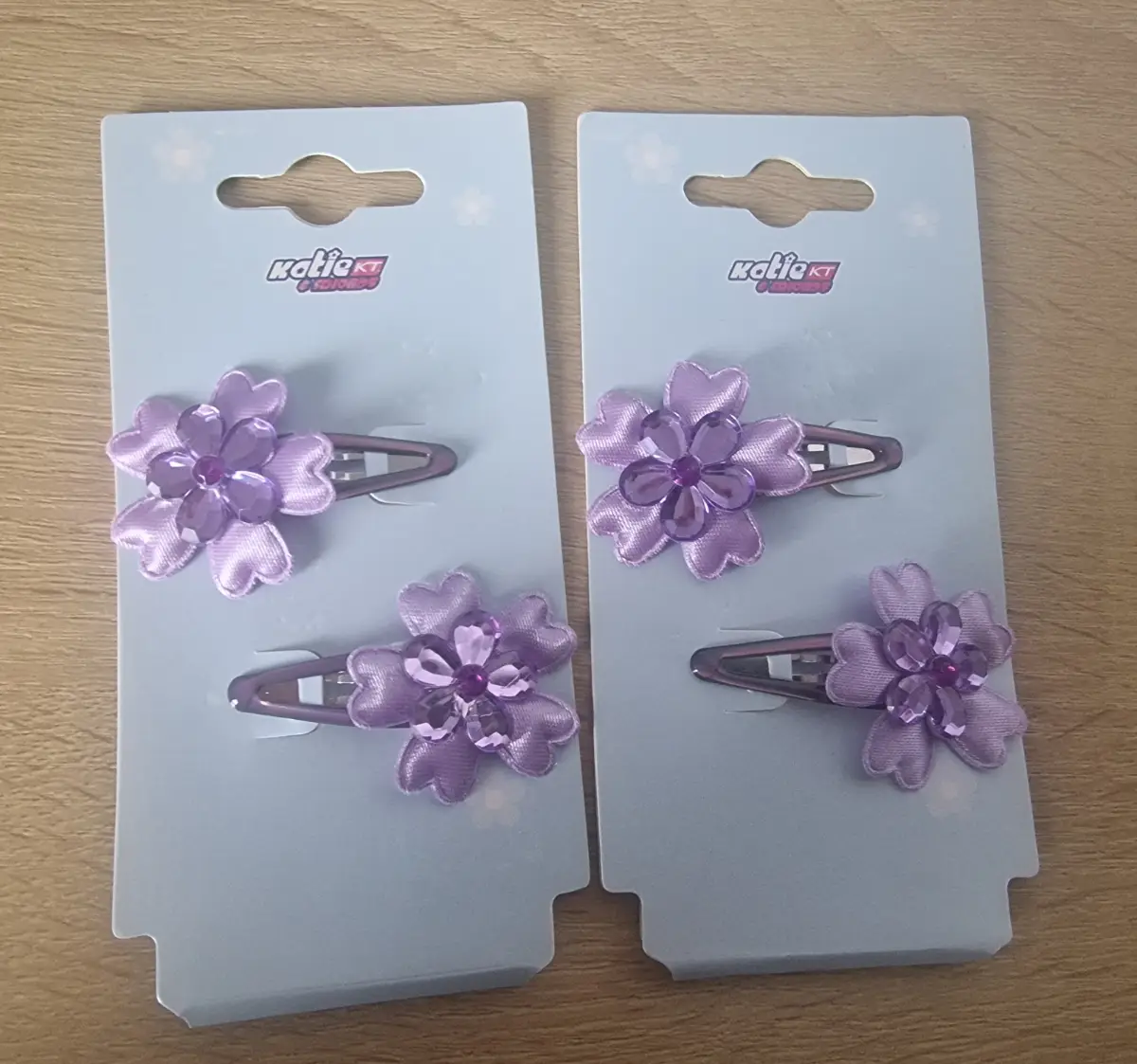 2x Katie KT Brand New Purple Flower Hair Clips Set - Brand new