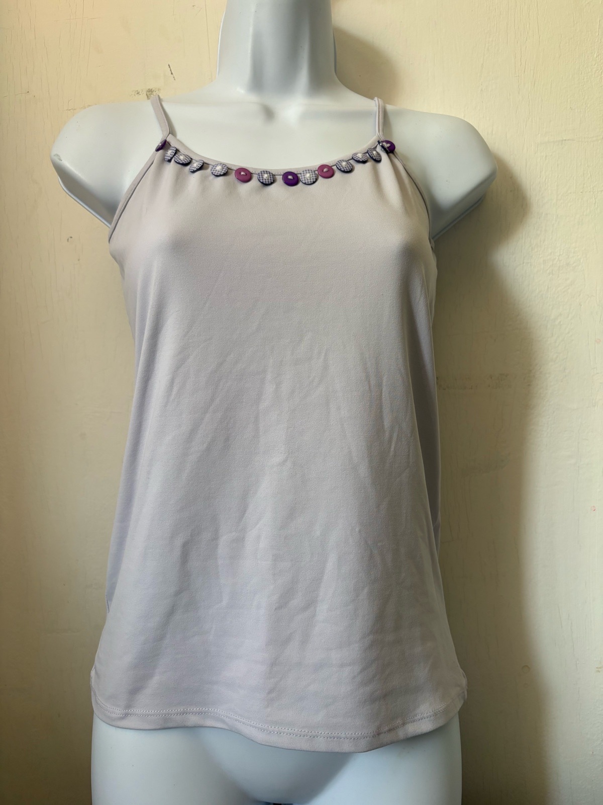 Lilac/purple cami top vest with purple buttons along the neckline