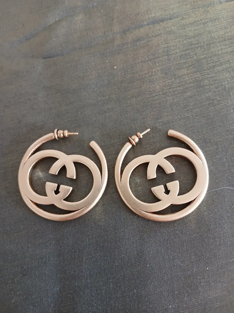 Gold-tone brass metal GG hoop earrings