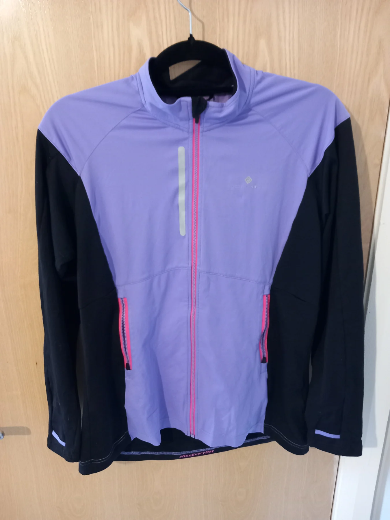 Ronhill running Bright Purple windbreaker reflectors for night run womans 12