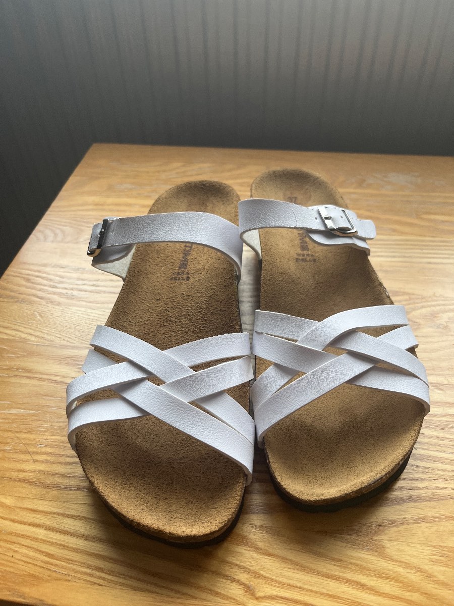Women’s white strap sandals with buckle