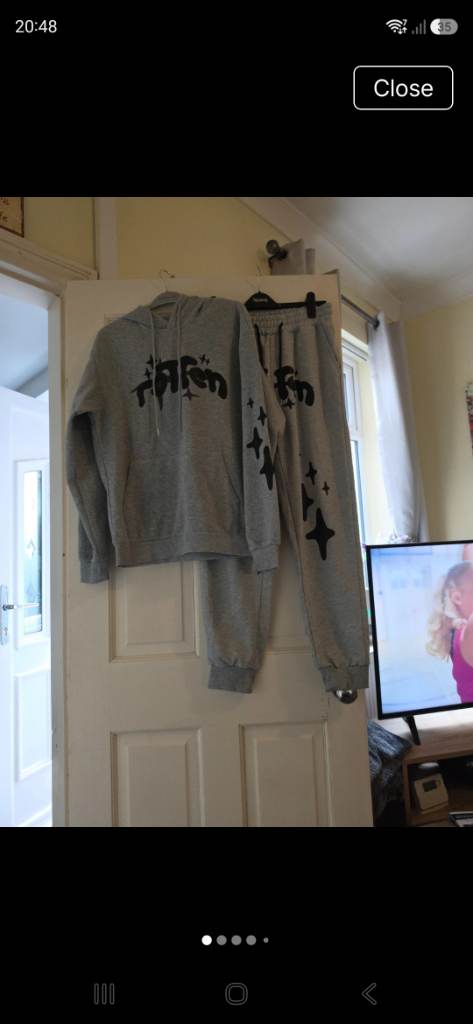 Grey tracksuit with black print