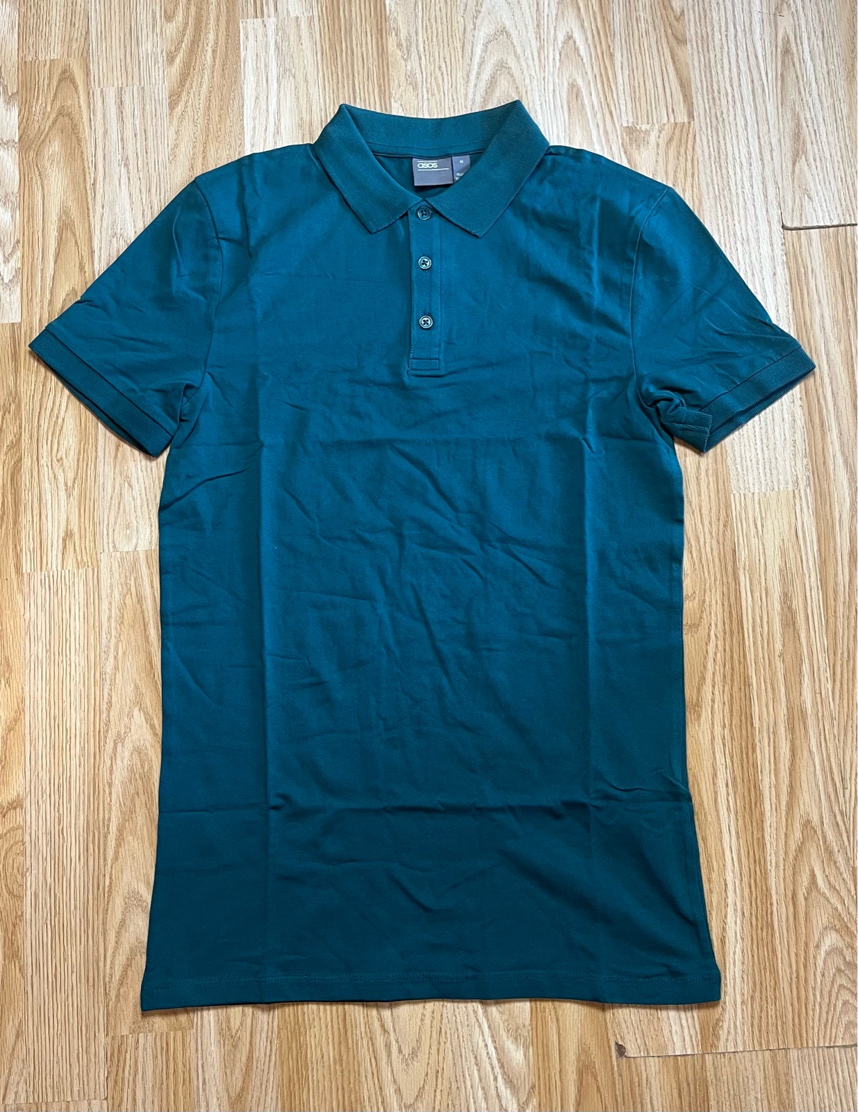 ASOS Design muscle fit jersey polo in green