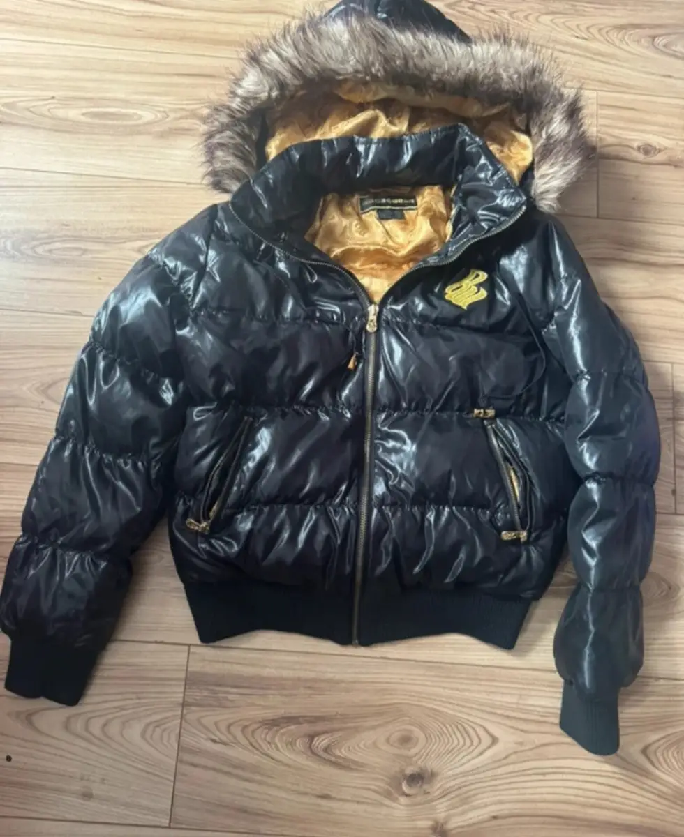 Womens rocafella jacket medium very good condition black and gold summer sale now on