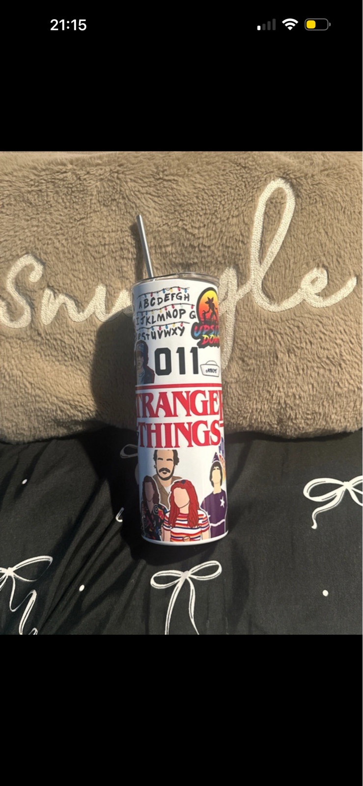 Stranger things tumbler with metal straw.