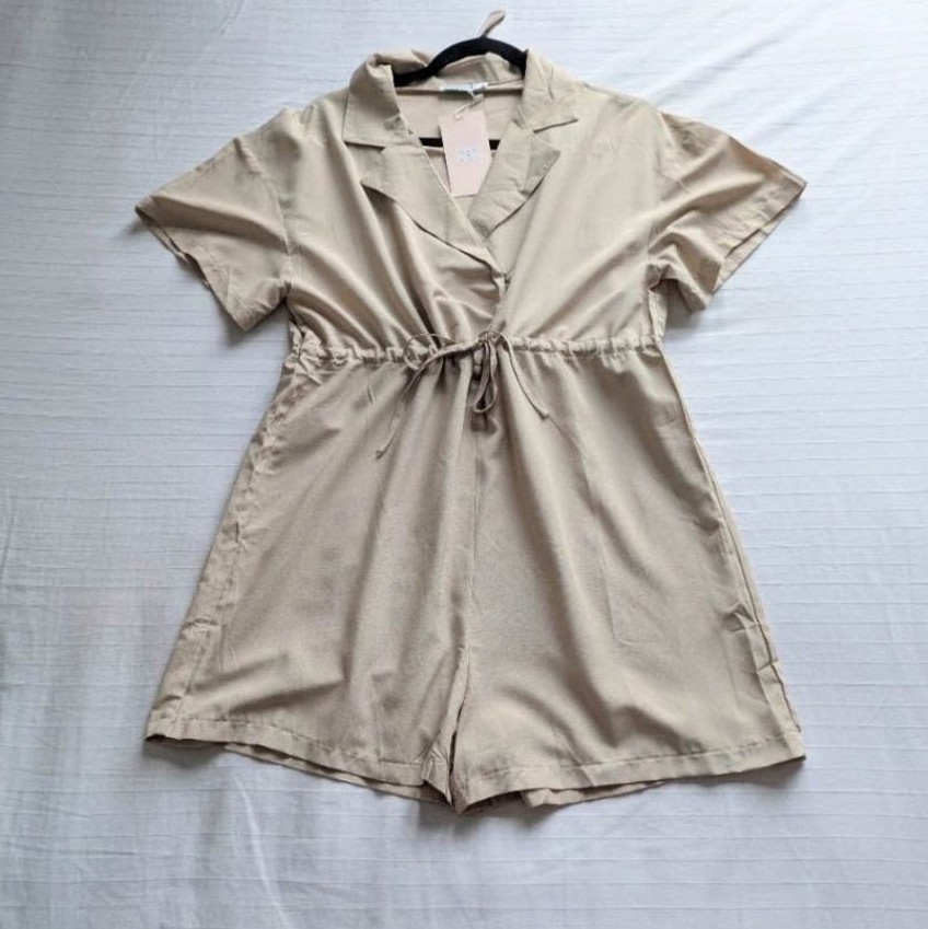 Plain beige minimalist playsuit with lapel collar, snap button and drawstring waist UKM NWT