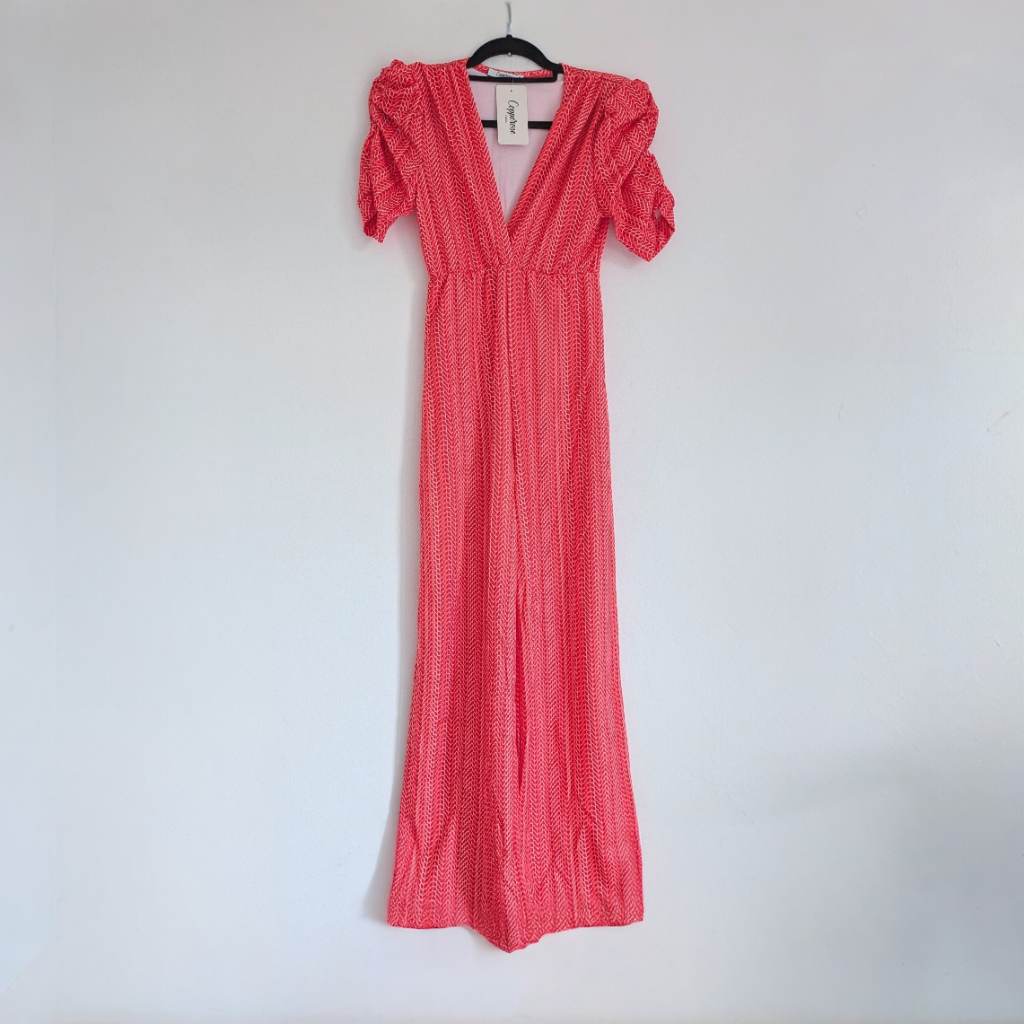 Long flared leg red jumpsuit with plunge V neckline and gathered gigot sleeves UKS New