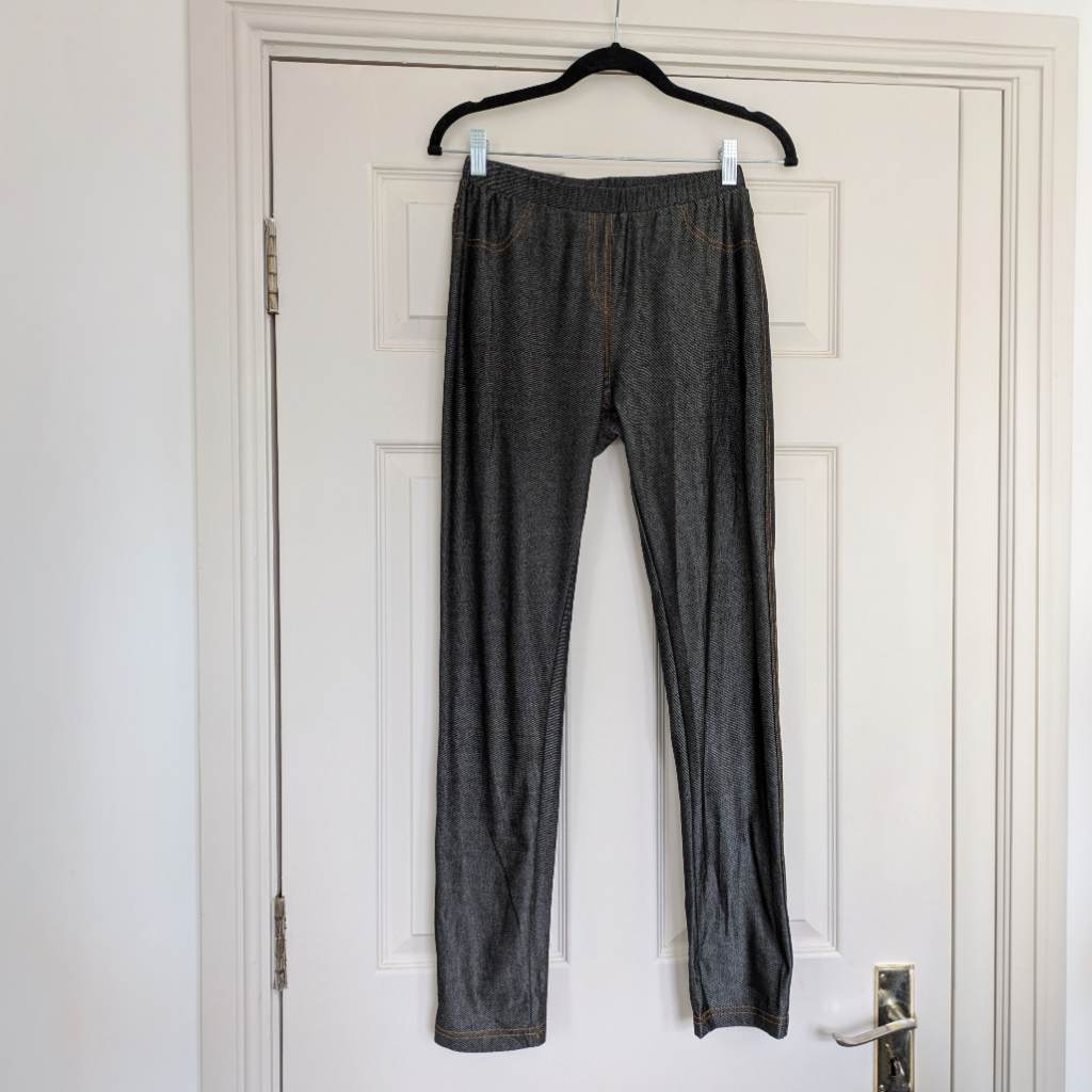 Shimmery grey iredescent leggings with orange contrast stitching and two true back pockets UK12