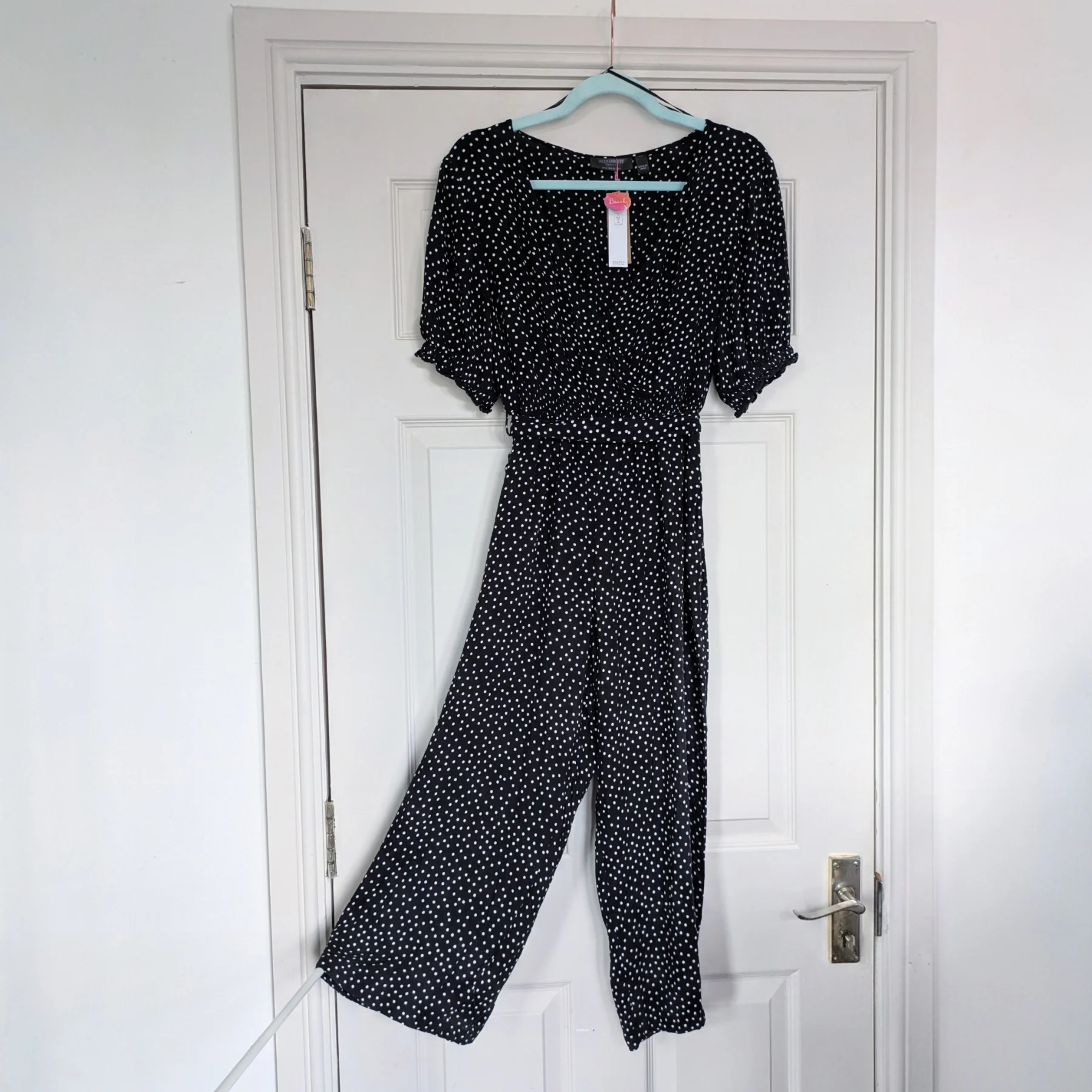Polka dot black and white wide leg cropped belted VNeck jumpsuit with smocked waist UK12