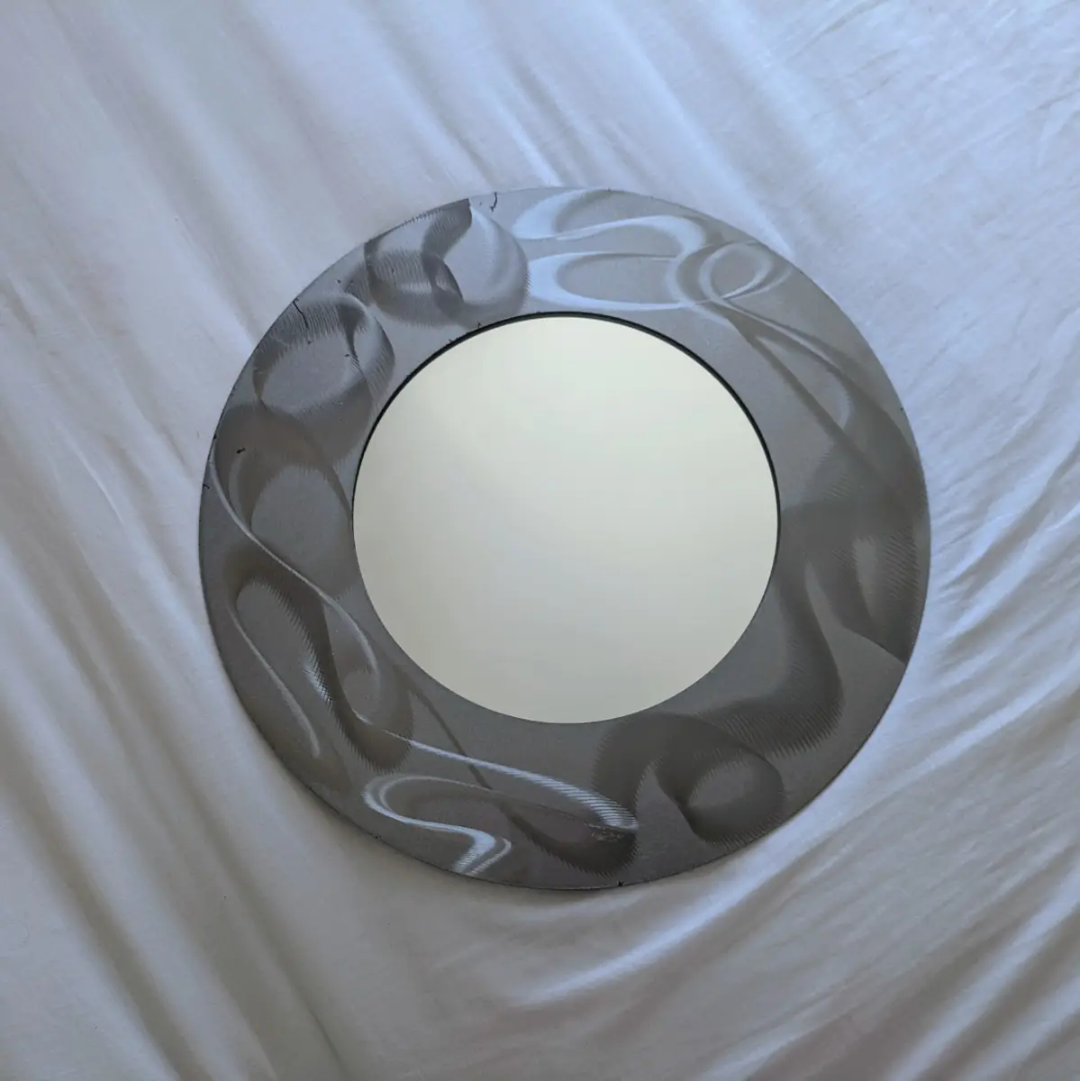 English medium size silver holographic round mirror with sturdy welded hook GC