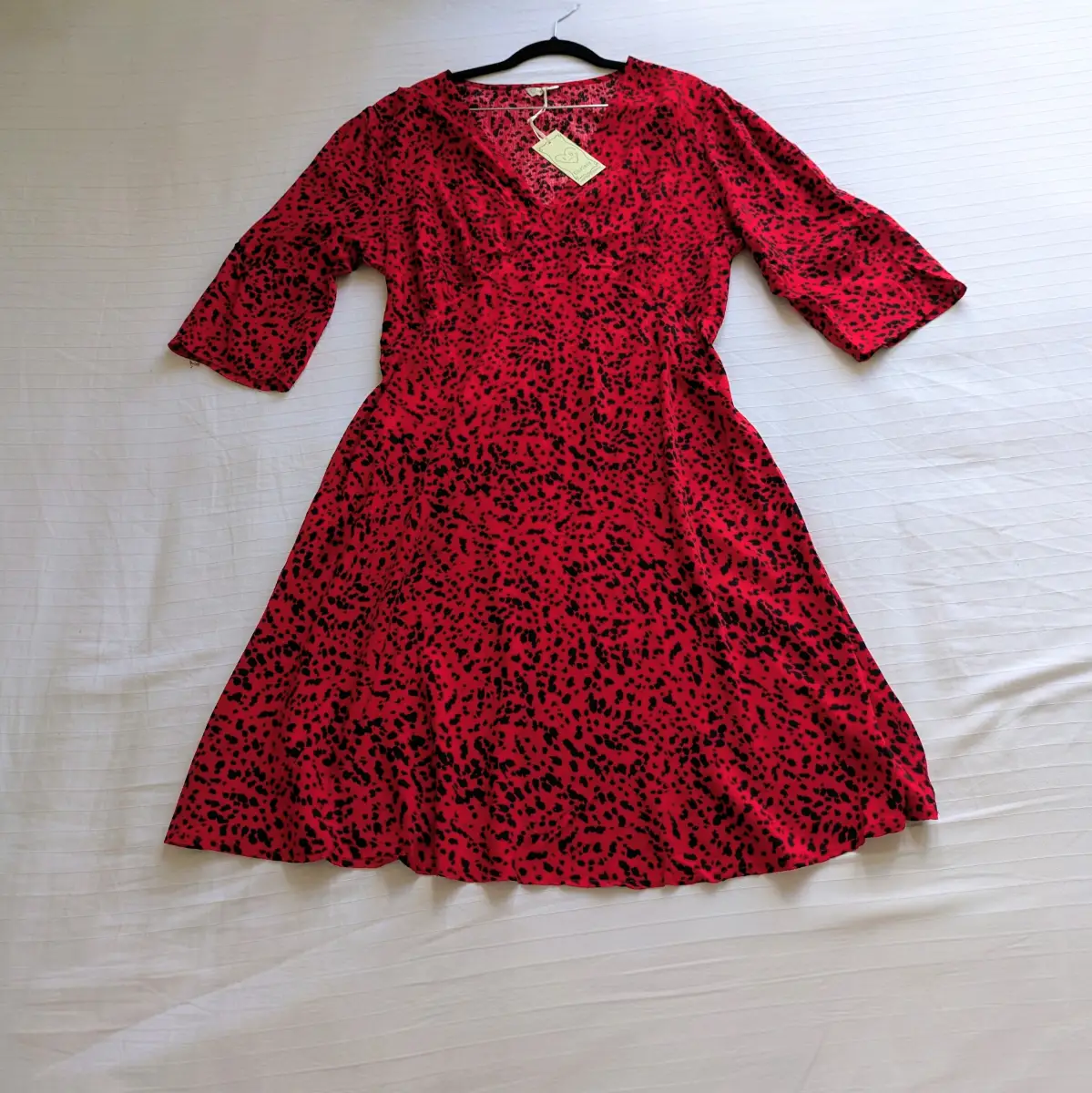 Red VNeck knee length dress with black spots and adjustable roll tab sleeves UK10-12 New