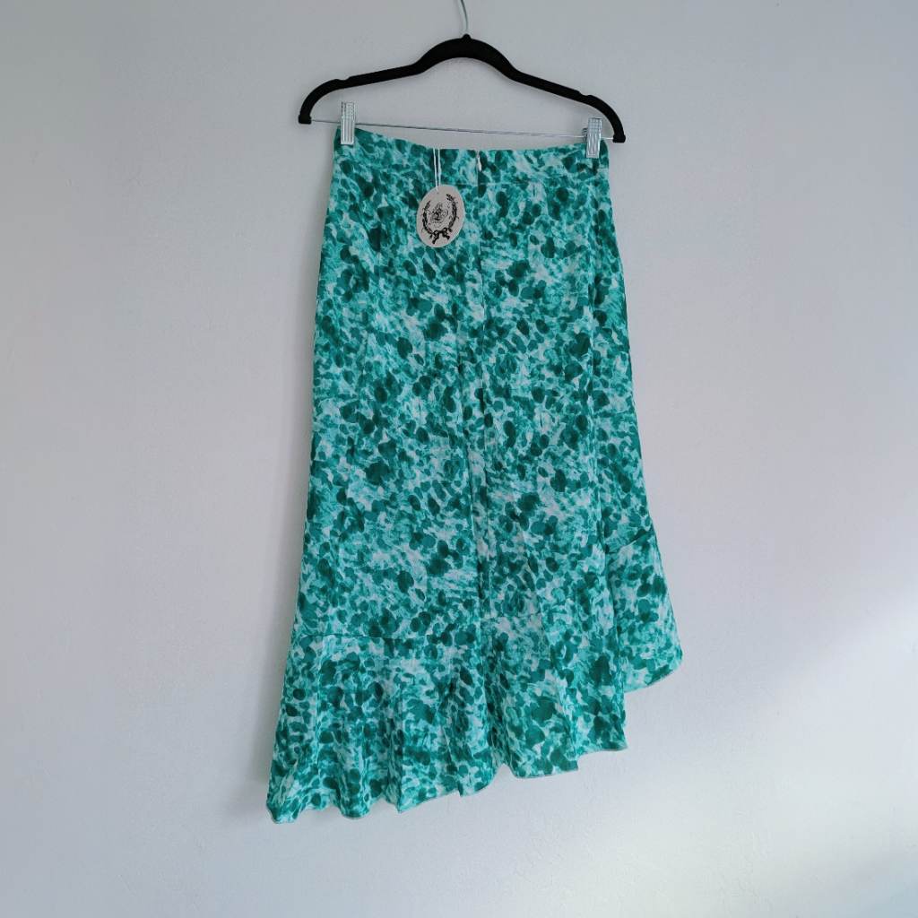 Green fluttery summer skirt with side ruffles, concealed back zipper and an asymmetrical hemline UKS