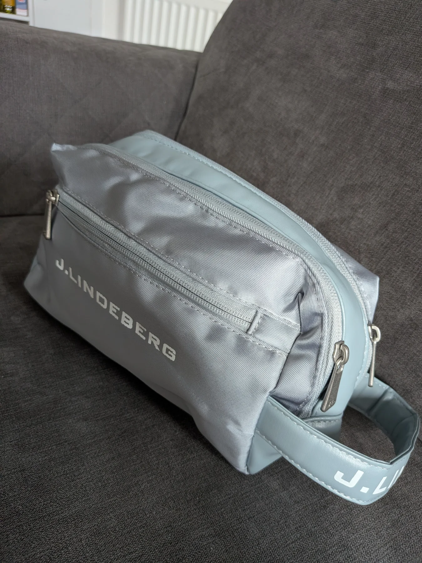 J Lindeberg silver blue travel wash bag golf toiletries accessories