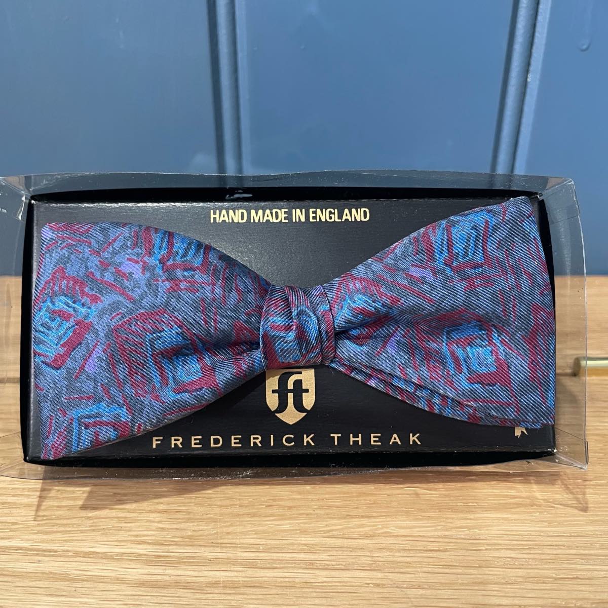 Frederick Theak Adjustable Pre-Tied 100% Silk Bow Tie - grey with blue and red.