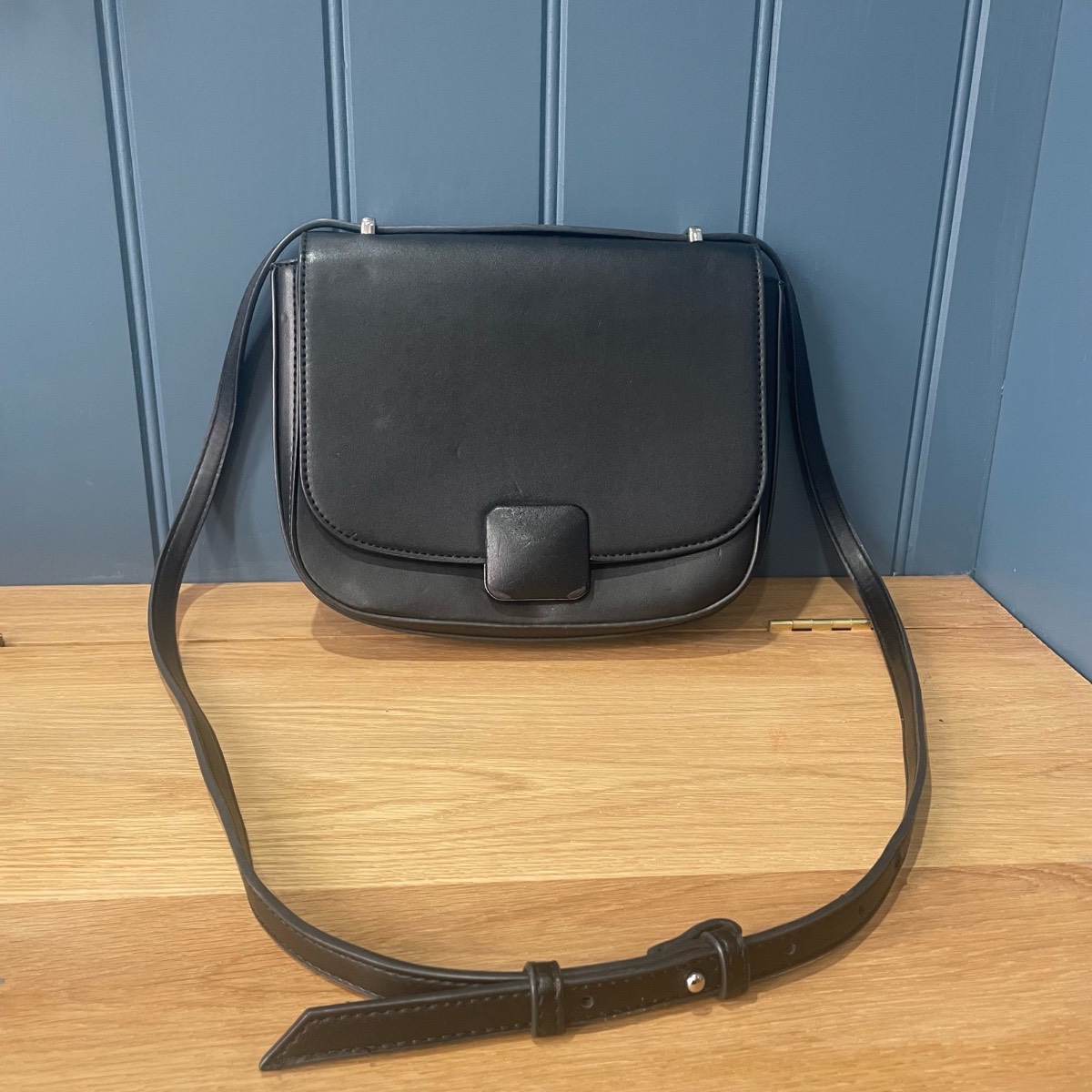 M&S collection black crossbody bag with adjustable strap.