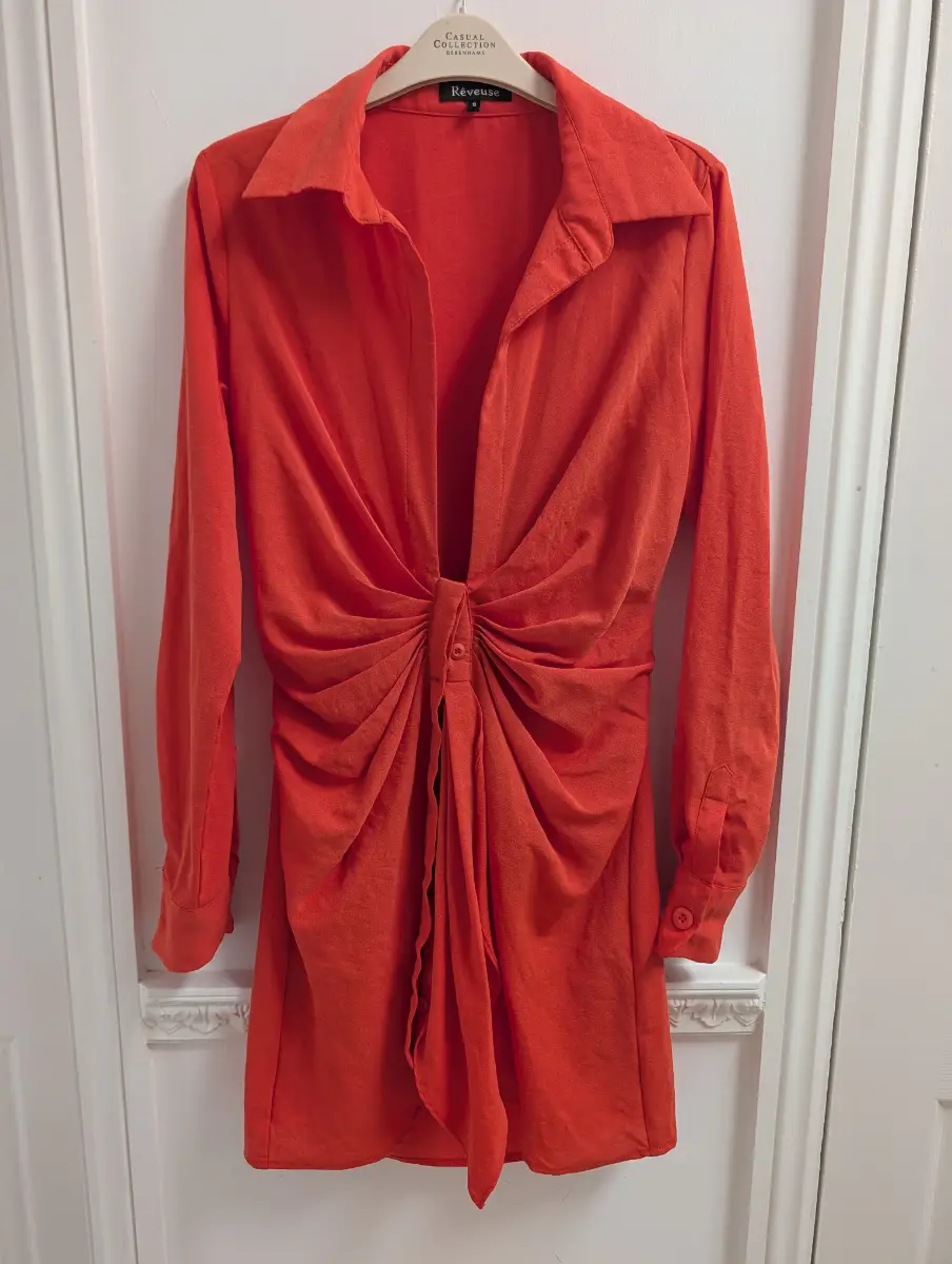 Reveuse orange deep cut dress size small