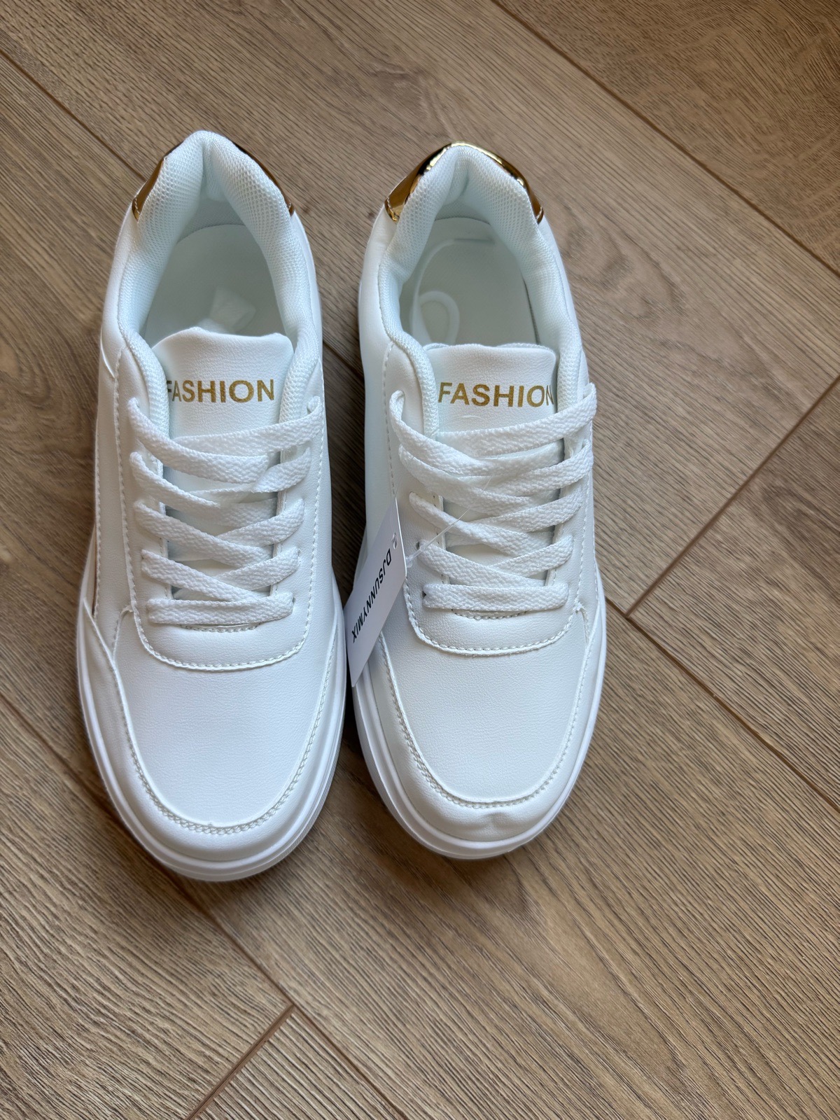 Fashion-Brand new white trainers with gold detail.